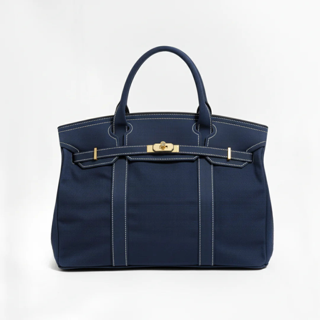 Navy canvas tote bag with gold-tone hardware